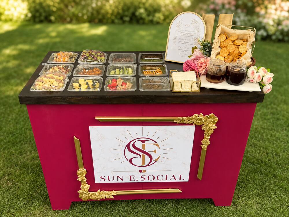 Sun E. Social cart filled with curated charcuterie selections